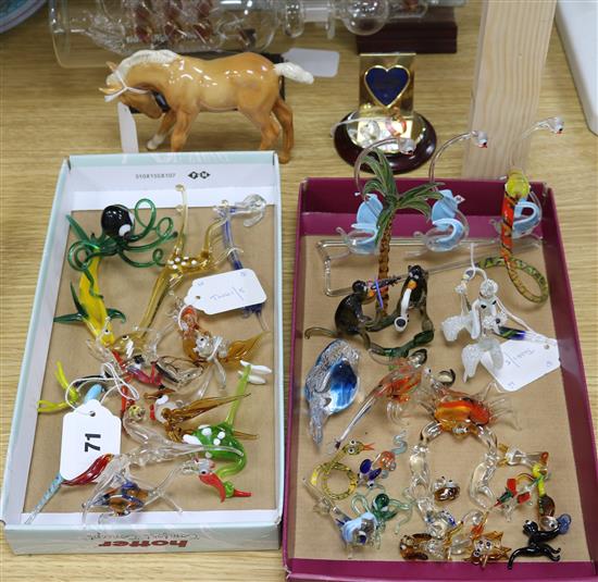 A Beswick Palomino foal and a collection of miniature coloured glass animals,